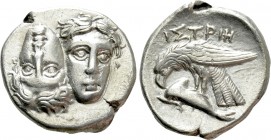 MOESIA. Istros. Drachm (4th century BC). 

Obv: Facing male heads, the right inverted.
Rev: ΙΣΤΡΙΗ. 
Sea eagle right, grasping dolphin with talons...