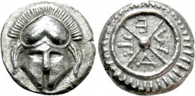 THRACE. Mesambria. Diobol (Circa 420-320 BC). 

Obv: Facing helmet.
Rev: M - E - T - A. 
Four-spoked wheel.

SNG BM Black Sea 268-9 & 271; HGC 3...