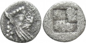 THRACO-MACEDONIAN REGION. Uncertain. Hemiobol (5th century BC). 

Obv: Head of Satyr right.
Rev: Quadripartite incuse square.

CNG E-299, lot 146...