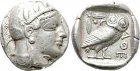 ATTICA. Athens. Tetradrachm (Circa 465-460 BC). Transitional issue. 

Obv: Helmeted head of Athena right, with frontal eye.
Rev: AΘE. 
Owl standin...