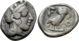 ATTICA. Athens. Drachm (Circa 454-404 BC). 

Obv: Helmeted head of Athena right.
Rev: AΘE. 
Owl standing right, head facing; olive sprig to left; ...