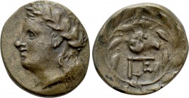 ACHAIA. Pellene. Ae (Circa 325-300 BC). 

Obv: Laureate head of Apollo left.
Rev: Head of ram right within wreath; monogram and star below.

Hoov...
