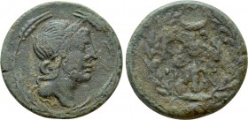 MYSIA. Kyzikos. Pseudo-autonomous. Ae (1st century AD). 

Obv: Head of Kore right, in corn wreath.
Rev: KYZI. 
Caduceus with crescent; monogram in...