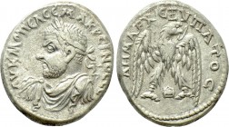 MESOPOTAMIA. Edessa. Macrinus (217-218). Tetradrachm. 

Obv: ΑΥ Κ Μ ΟΠЄΛ CЄΥ ΜΑΚΡЄΙΝΟC CЄ. 
Laureate, draped and cuirassed bust left.
Rev: ΔΗΜΑΡΧ ...