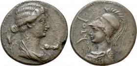 SYRTICA. Oea. Livia (Augusta, 14-29). Ae. 

Obv: Draped bust right, grain behind; before, peacock standing right.
Rev: WY'T. 
Helmeted bust of Min...