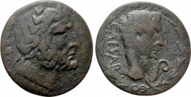 SYRTICA. Sabratha. Tiberius (14-37). Ae. 

Obv: SBRT'N, MN SY (in front). 
Laureate head of Baal-Melqart right.
Rev: CAESAR. 
Bare head of August...
