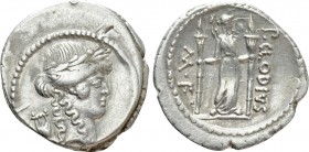 P. CLODIUS M.F. TURRINUS. Denarius (42 BC). Rome. 

Obv: Laureate head of Apollo right; lyre to left.
Rev: P CLODIVS / M F. 
Diana standing right,...