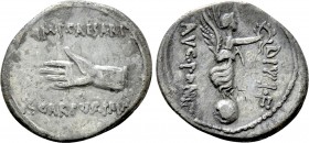OCTAVIAN. Denarius (31 BC). Cyrene. L. Pinarius Scarpus, moneyer. 

Obv: IMP CAESARI / SCARPVS IMP. 
Open hand left.
Rev: AVG PONT / DIVI F. 
Vic...