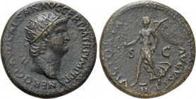 NERO (54-68). Dupondius. Lugdunum. 

Obv: NERO CLAVD CAESAR AVG GER P M TR P IMP P P. 
Laureate head right, with globus at point of neck.
Rev: VIC...