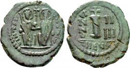 JUSTIN II with SOPHIA (565-578). Decanummium. Theoupolis (Antioch). Dated RY 5 (569/70). 

Obv: Justin and Sophia seated facing on double throne, ea...