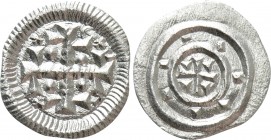 HUNGARY. István II (1116-1131). Denar. 

Obv: Cross with pellets in angles.
Rev: Short cross with pellets in each angle.

Huszár 76; Lengyel 10/7...