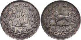 Iran 5000 Dinar 1293 
KM# A914; AH 1293; Silver 23.16g.; AUNC; A beautiful rare specimen with an old smooth patina and zekkal stamp shine