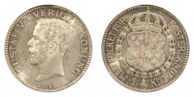 SWEDEN. Gustaf V, 1907-50. Krona 1912, Stockholm. 7.5 g. Mintage 303,420. KM# 786. One of the scarcest dates in the series. In US plastic holder, grad...