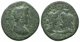 CILICIA, Flaviopolis-Flavias. Commodus. AD 177-192. Æ. Dated CY 114 (AD 186/7). Laureate, draped, and cuirassed bust of Commodus right / Draped busts ...