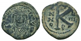 Maurice Tiberius, 582-602. Half Follis 
Condition: Very Fine

Weight: 4,8 gram
Diameter: 22,9 mm