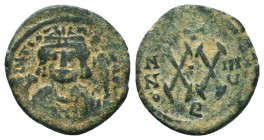 Maurice Tiberius, 582-602. Half Follis 
Condition: Very Fine

Weight: 5,7 gram
Diameter: 21 mm