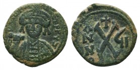 Maurice Tiberius, 582-602. Half Follis 
Condition: Very Fine

Weight: 2,7 gram
Diameter: 16,1 mm