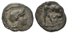 Southern Apulia, Tarentum, c. 325-280 BC. AR Diobol (10mm, 0.74g, 3h). Helmeted head of Athena r., helmet decorated with three circles; I on neck-guar...