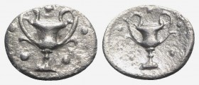 Southern Apulia, Tarentum, c. 280-228 BC. AR Obol (9mm, 0.51g, 6h). Kantharos; five pellets around. R/ Kantharos; five pellets around. Vlasto 1655-6; ...