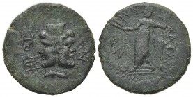 Sicily, Katane, c. 2nd century BC. Æ (24mm, 9.41g, 12h). Janiform head of Serapis; three monograms around. R/ Demeter standing l., holding grain ears ...