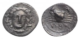 Sicily, Motya, c. 400-397 BC. AR Litra (11mm, 0.69g, 9h). Head of nymph facing slightly r. R/ Crab. Campana 24a; SNG ANS 508; HGC 2, 937. Rare, VF - G...