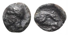 Sicily, Segesta, c. 400-390 BC. Æ (9mm, 0.88g, 9h). Male head l. R/ Forepart of hound r. CNS I -; SNG ANS -; HGC 2, -. Very Rare, near VF