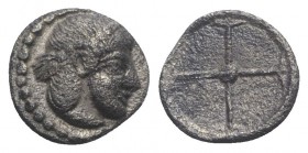 Sicily, Syracuse. Hieron I (478-466 BC). AR Obol (7mm, 0.54g), c. 475-470. Diademed head of Arethusa r. R/ Wheel of four spokes. SNG ANS 116; HGC 2, 1...