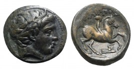 Kings of Macedon, Philip II (359-336 BC). Æ (18mm, 6.30g, 2h). Uncertain mint in Macedon. Head of male r., wearing tainia. R/ Horseman riding r.; prow...
