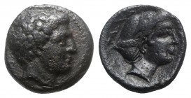 Thessaly, Phalanna, 3rd century BC. Æ Trichalkon (19mm, 7.71g, 11h). Youthful male head r.; monogram behind. R/ Head of nymph r., hair bound in sakkos...