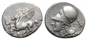 Corinth, c. 375-300 BC. AR Stater (21mm, 8.60g, 6h). Pegasos flying l. R/ Helmeted head of Athena l.; Δ-I flanking neck truncation; behind, Artemis ru...