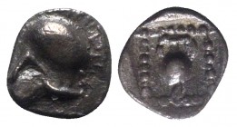 Asia Minor, Uncertain (perhaps Neandria in Troas?), c. 450 BC. AR Hemiobol (5mm, 0.22g, 12h). Corinthian helmet l. R/ Amphora within square incuse. Un...