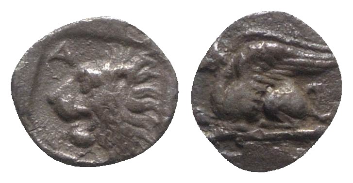 Troas, Assos, 5th century BC. AR Obol (7mm, 0.39g, 9h). Griffin l. R/ Lion’s hea...