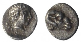 Troas, Kebren, c. 4th century BC. AR Tetartemorion (4mm, 0.11g, 12h). Laureate Head of Apollo r. R/ Head of ram r. Cf. BMC 14 (Hemiobol). EF