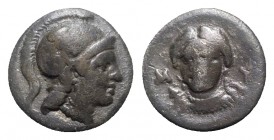 Aeolis, Myrina, 4th century BC. AR Hemidrachm (12mm, 1.86g, 12h). Head of Athena r., wearing helmet decorated with a griffin. R/ Head of Artemis facin...