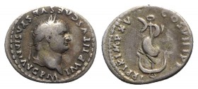 Titus (79-81). AR Denarius (19mm, 3.33g, 12h). Rome, AD 80. Laureate head r. R/ Dolphin coiled around anchor. RIC II 112; RSC 309. Toned, VF