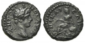 Caracalla (198-217). Bithynia, Nicaea. Æ (13mm, 2.36g, 12h). ANTONINOC AVΓ, Laureate head r. R/ Tyche seated l. on rocks, holding ears of corn, restin...