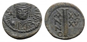 Justinian I (527-565). Æ 10 Nummi (16mm, 3.33g, 6h). Ravenna, year 35 (561/2). Diademed, helmeted and cuirassed facing bust, holding globus cruciger a...