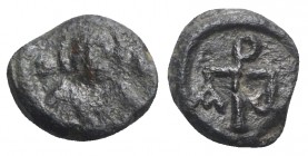 Justinian I (527-565). Æ Nummus (9mm, 0.73g, 9h). Carthage, 534-565. Helmeted and draped facing bust; stars flanking. R/ Christogram; A-ω flanking. MI...
