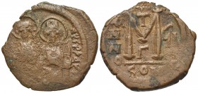 Justin II with Sophia (565-578). Æ 40 Nummi (30mm, 15.49 g, 7h). Constantinople, year 7 (571/2). Nimbate figures of Justin and Sophia seated facing on...