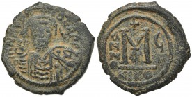 Maurice Tiberius (582-602). Æ 40 Nummi (30mm, 11.96g, 6h). Nicomedia, year 6 (587/8). Helmeted and cuirassed bust facing, holding globus cruciger and ...