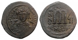 Maurice Tiberius (582-602). Æ 40 Nummi (31mm, 11.83g, 6h). Theopolis (Antioch), year 7 (588/9). Crowned bust facing, wearing consular robes, holding m...