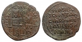 Basil I and Constantine (867-886). Æ 40 Nummi (30mm, 7.99g, 6h). Constantinople, 568-870. Basil and Constantine seated facing, both crowned, holding l...