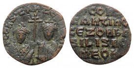 Constantine VII and Zoe (913-959). Æ 40 Nummi (23mm, 7.10g, 6h). Constantinople, 914-919. Crowned facing busts of Constantine, beardless and wearing l...