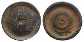 Byzantine Æ Ounce Round Commercial Weight, 5th-7th centuries AD (26mm, 21.98g). Engraved N Є, cross above. R/ Blank. Good VF