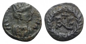 Ostrogoths, Theoderic (493-526). Æ 10 Nummi (15mm, 2.50g, 6h). Ravenna. Mantled bust of Tyche r., wearing mural crown. R/ Monogram of Ravenna; cross a...