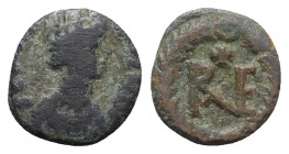 Ostrogoths, Theoderic (493-526). Æ 10 Nummi (14mm, 1.79g, 6h). Ravenna. Mantled bust of Tyche r., wearing mural crown. R/ Monogram of Ravenna; cross a...