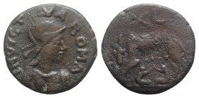 Ostrogoths, Athalaric (526-534). Æ 40 Nummi (23.5mm, 13.36g, 12h). Rome. 526-534. Helmeted and cuirassed bust of Roma r. R/ She-wolf standing l., head...