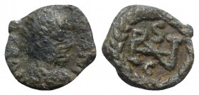 Ostrogoths, Athalaric (526-534). Æ Nummus (10mm, 0.99g, 12h). Rome, in the name of Justinian. Diademed, draped and cuirassed bust of Justinian r. R/ M...