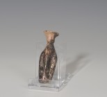 ROMA. Imperio Romano. Ungüentario (II-III d.C.). Con rehundimientos laterales. Altura 6,6 cm.
