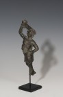 ROMA. Imperio Romano. Figura de Sátiro (I-II d.C.). Bronce. Vestido con piel animal y sujetando copa con la mano derecha. Faltan pies. Altura 16,2 cm....